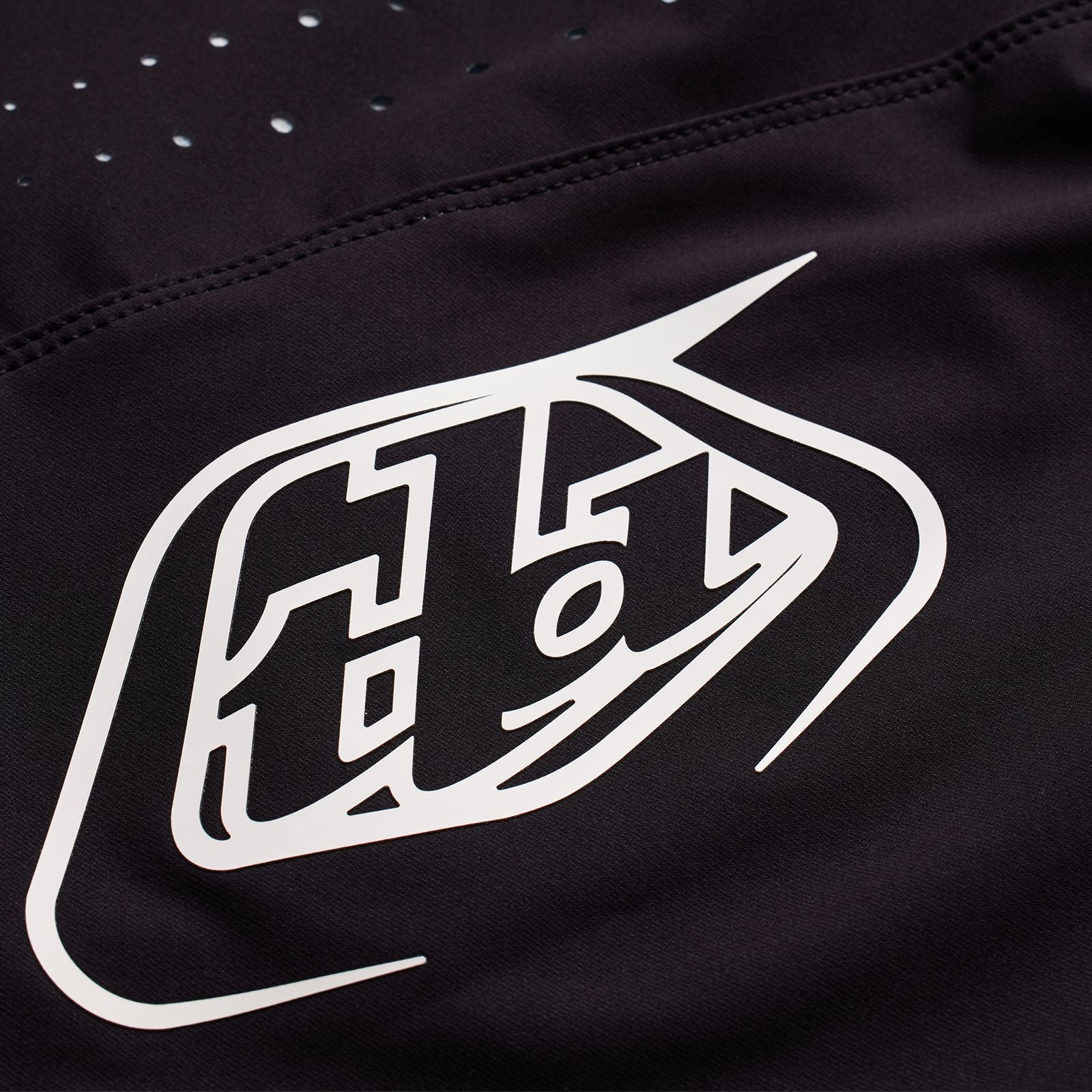 A close up of a TLD Sprint Pant Mono Black logo.