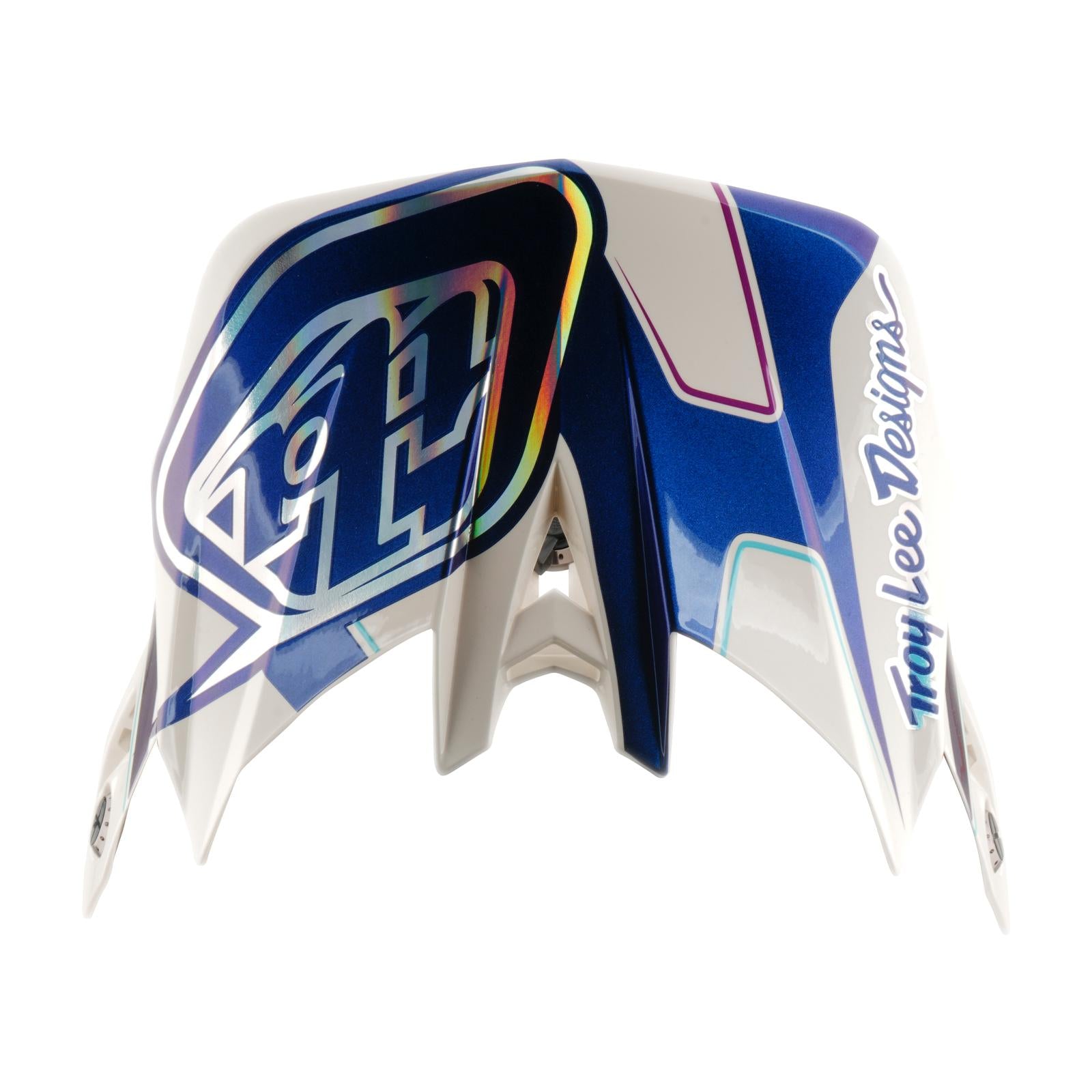 The TLD 26.1 D4 AS Composite Helmet in Flared White/Indigo features colorful graphics, Mips protection for enhanced safety, and the Troy Lee Designs logo on one side. Shown from above against a plain background.