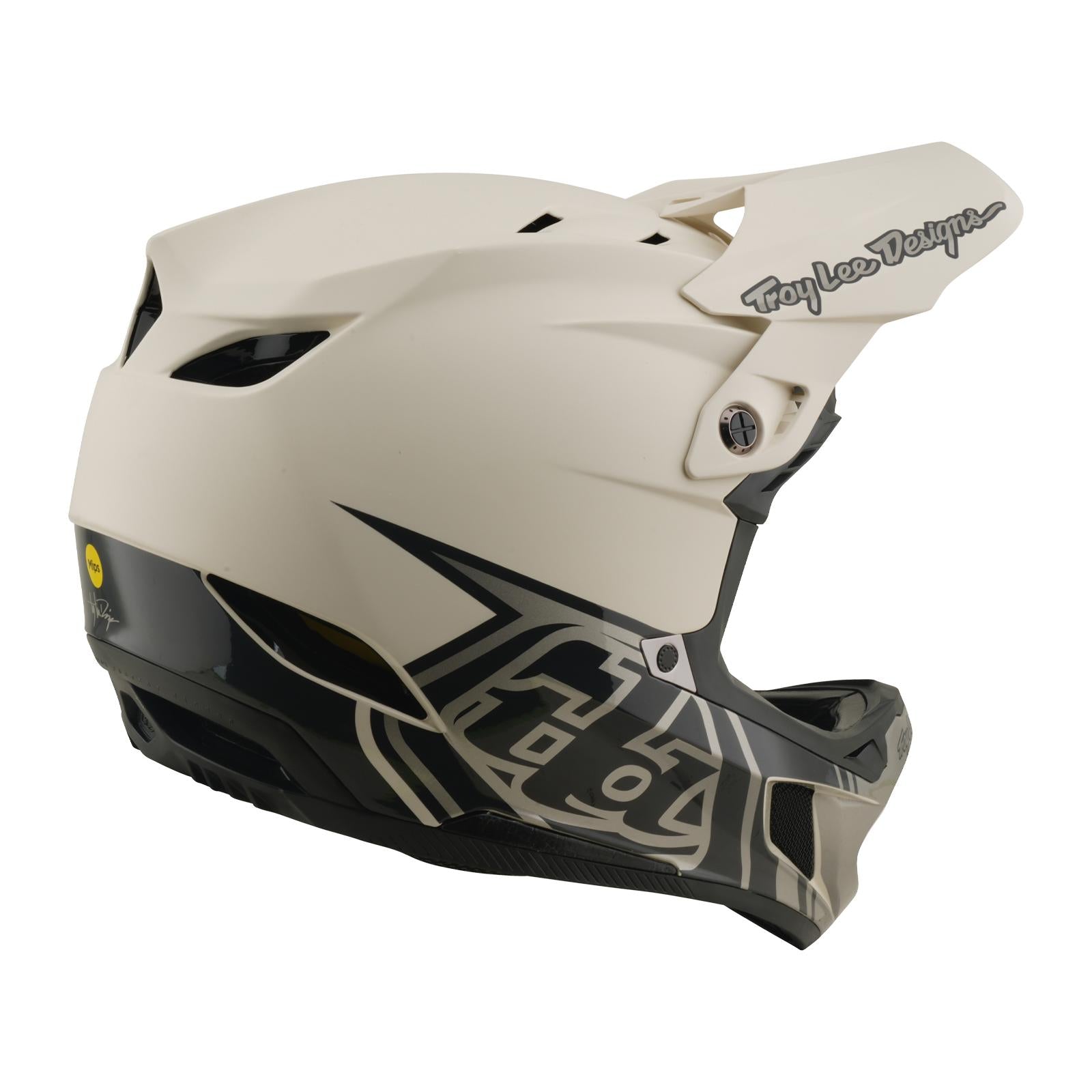The TLD 26.1 D4 AS Composite Helmet / Stealth Pumice is a white and black full-face downhill helmet with visor, Mips protection, and "Troy Lee Designs" branding, shown from a rear-side angle against a plain background.