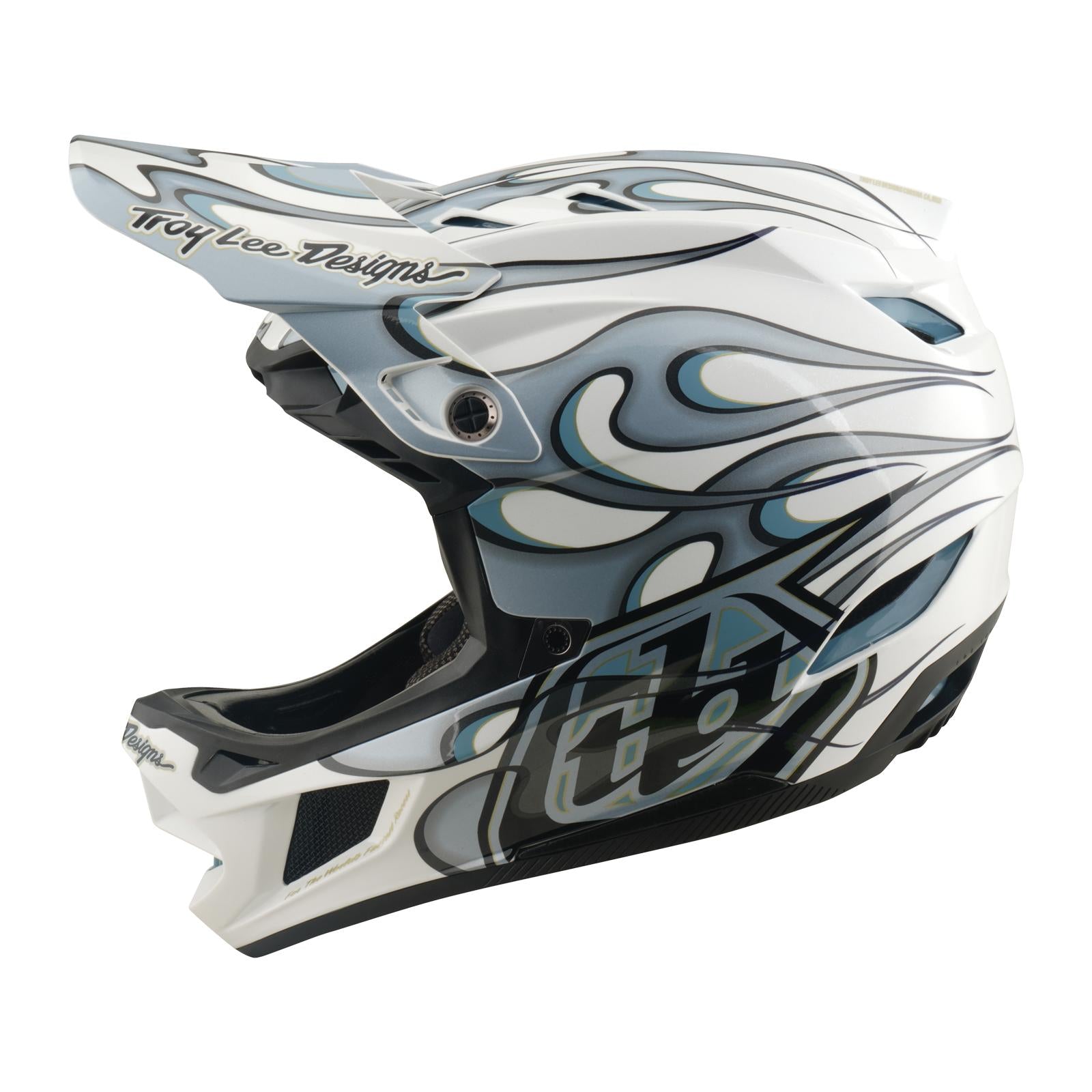 The TLD 26.1 D4 AS Composite Helmet / Torched White/Silver features black, blue, and gray flame graphics, a visor, “Troy Lee Designs” branding, and Mips protection—perfect for BMX or downhill riding.