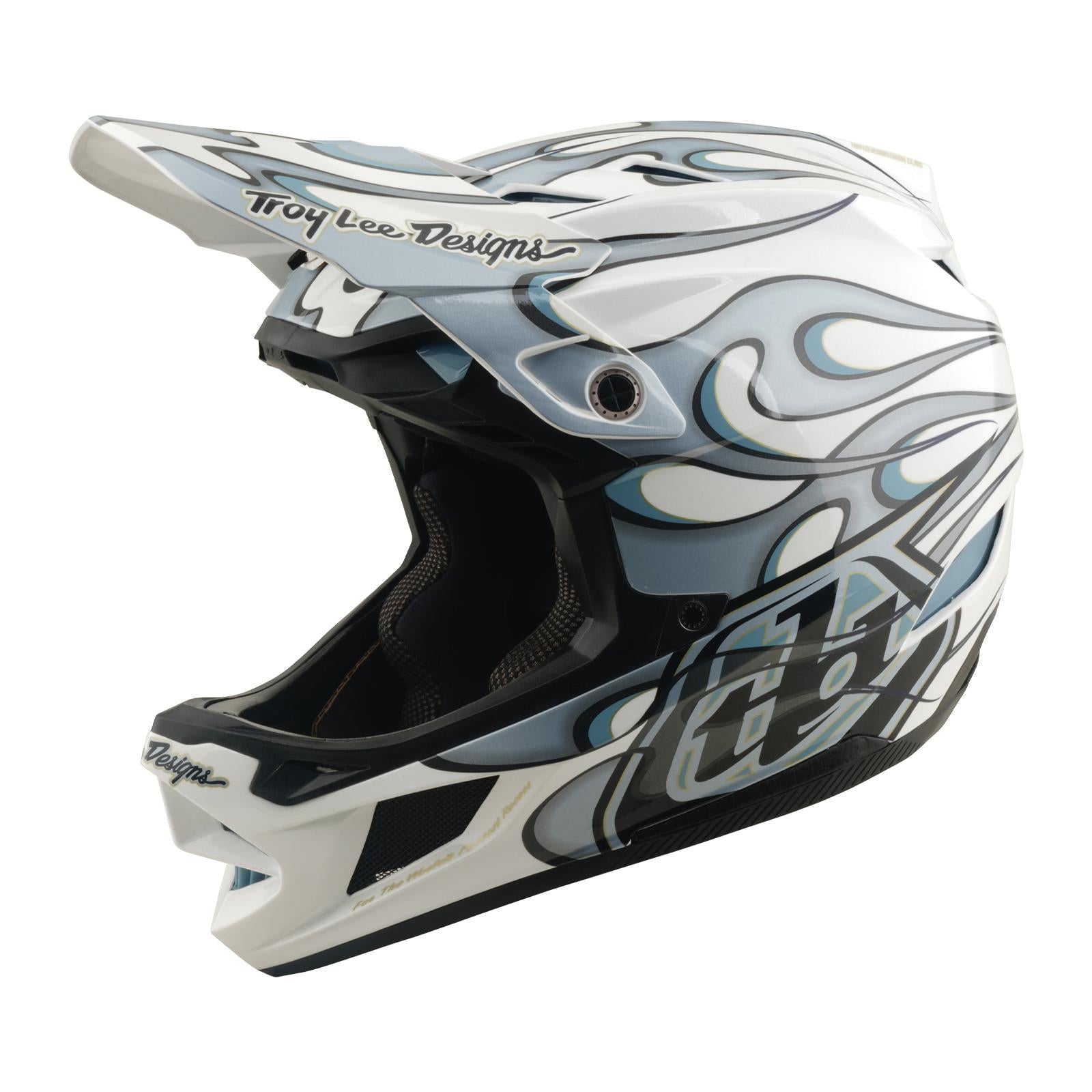 The TLD 26.1 D4 AS Composite Helmet in Torched White/Silver features a blue and white flame design, Troy Lee Designs branding, and Mips protection, shown from the side against a plain background.