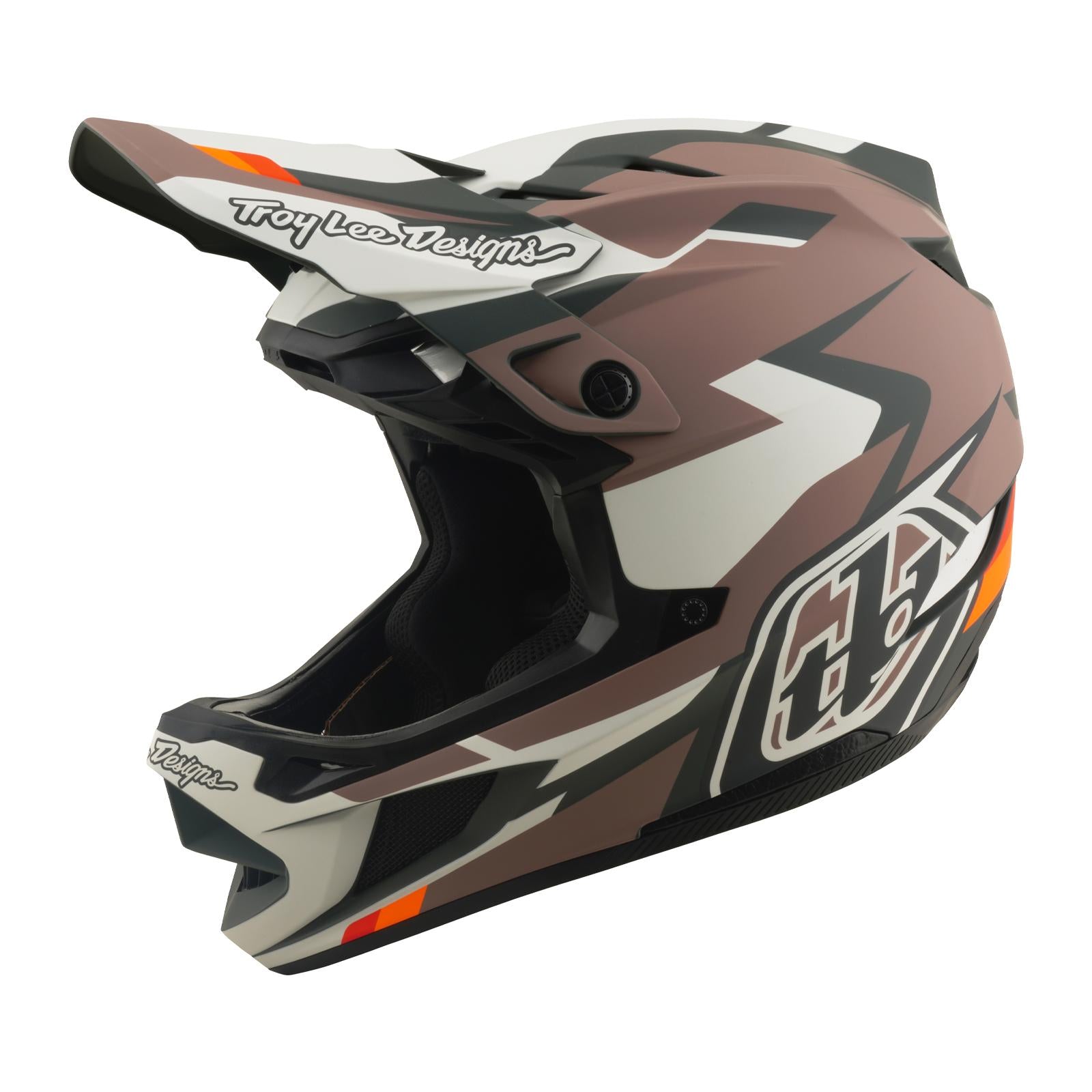 The TLD 26.1 D4 AS Polyacrylite Helmet / Roamer Clay is a matte full-face mountain bike helmet in black, white, grey, and brown geometric patterns with "Troy Lee Designs" text, an angular visor, and Mips brain protection for enhanced safety.