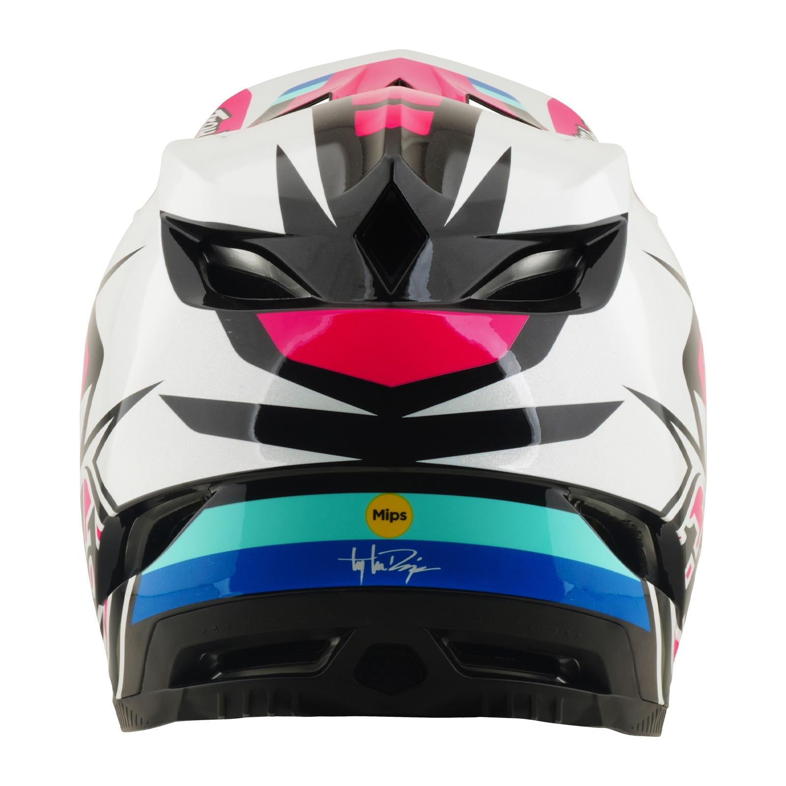 Back view of the TLD 26.1 D4 AS Polyacrylite Helmet in Roamer Magenta, a colorful full-face mountain biking helmet with bold black, pink, teal, and blue geometric patterns, signature detail, and a "Mips brain protection" safety label.