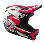 The TLD 26.1 D4 AS Polyacrylite Helmet / Roamer Magenta is a full-face helmet for motocross or mountain biking, featuring a pink, white, and black geometric design, Troy Lee Designs logos, and Mips brain protection for added safety.