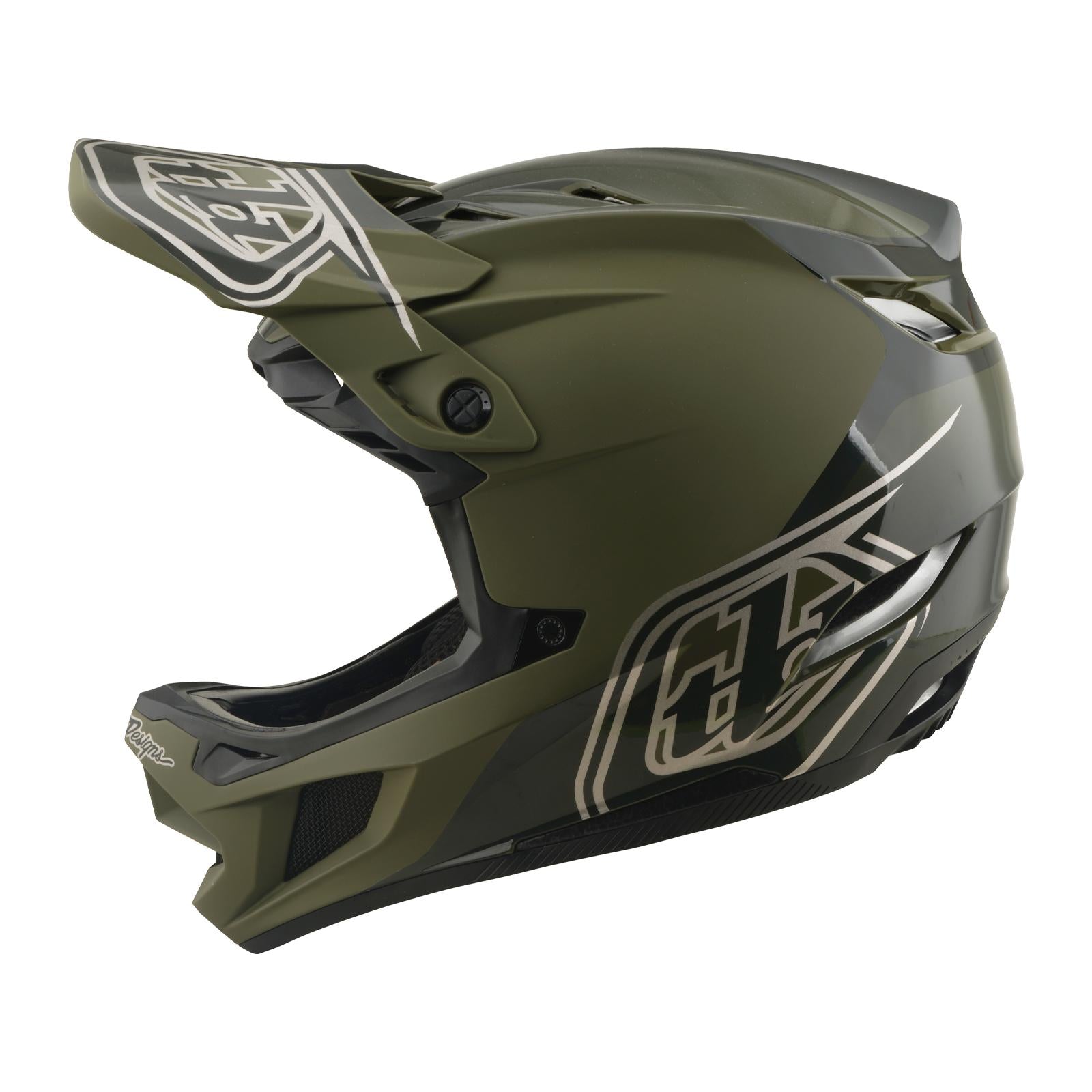The TLD 26.1 D4 AS Polyacrylite Helmet / Shadow Beetle is a matte green full-face helmet for motocross or mountain biking, featuring black and white graphics, visor, ventilation openings, and integrated Mips brain protection.