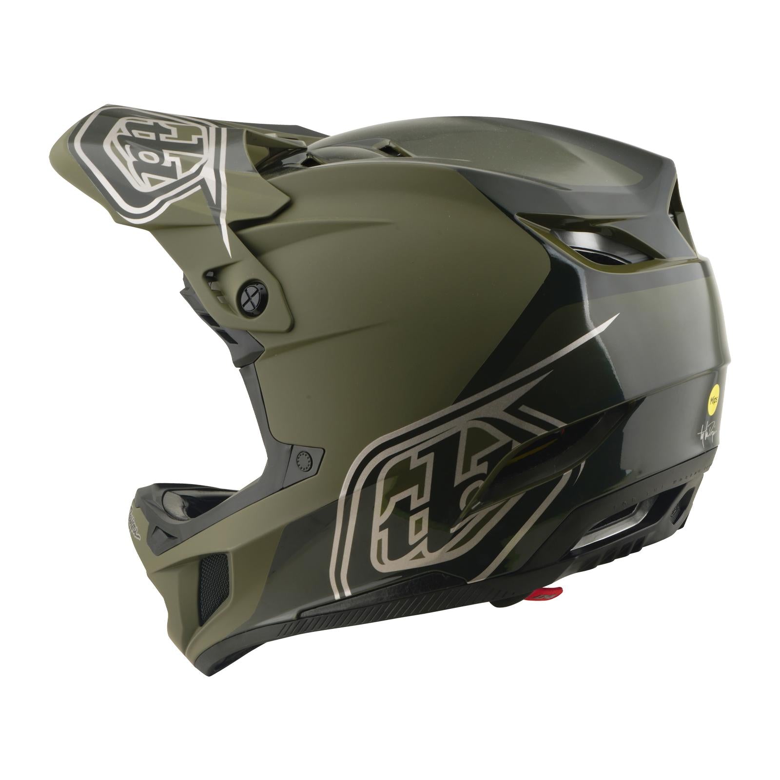 The TLD 26.1 D4 AS Polyacrylite Helmet in Shadow Beetle is a matte green and black full-face mountain biking helmet with Mips, geometric white graphics, a large visor, rear vents, shown from the side and slightly behind.
