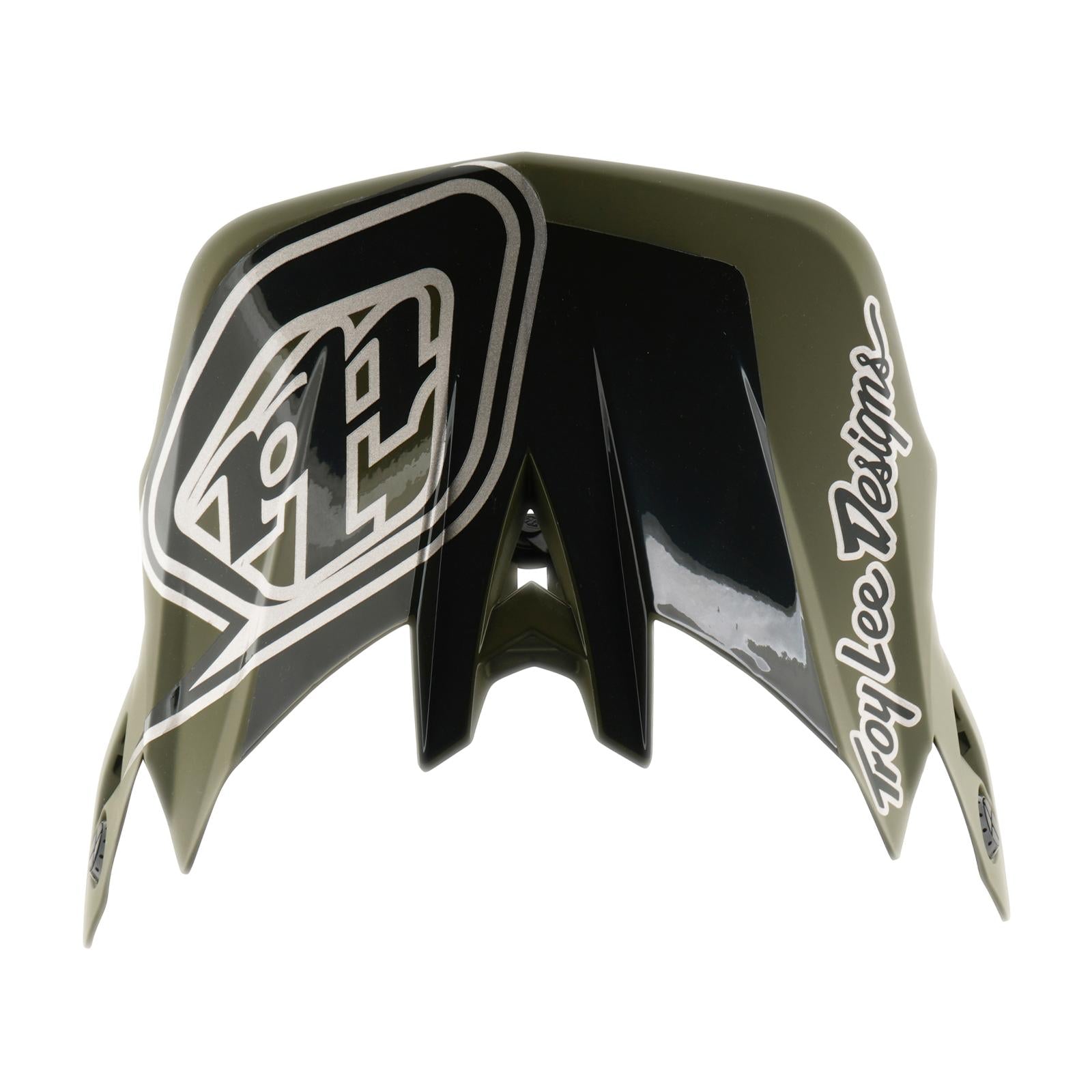The TLD 26.1 D4 AS Polyacrylite Helmet in Shadow Beetle features a green and black full-face visor, bold "TLD" logo on the left, "Troy Lee Designs" on the right, ideal for mountain biking and Mips brain protection compatible.
