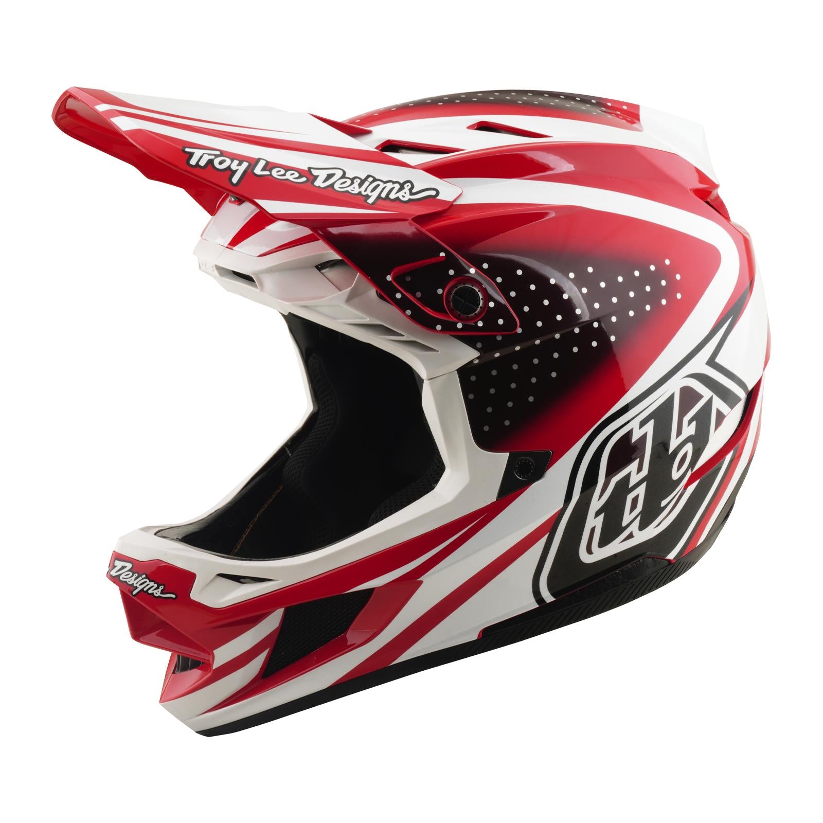 The TLD 26.1 D4 AS Polyacrylite Helmet in The Line Fire/White features Troy Lee Designs branding, a bold red, white, and black design, a large visor, and Mips protection—ideal for motocross or mountain biking.
