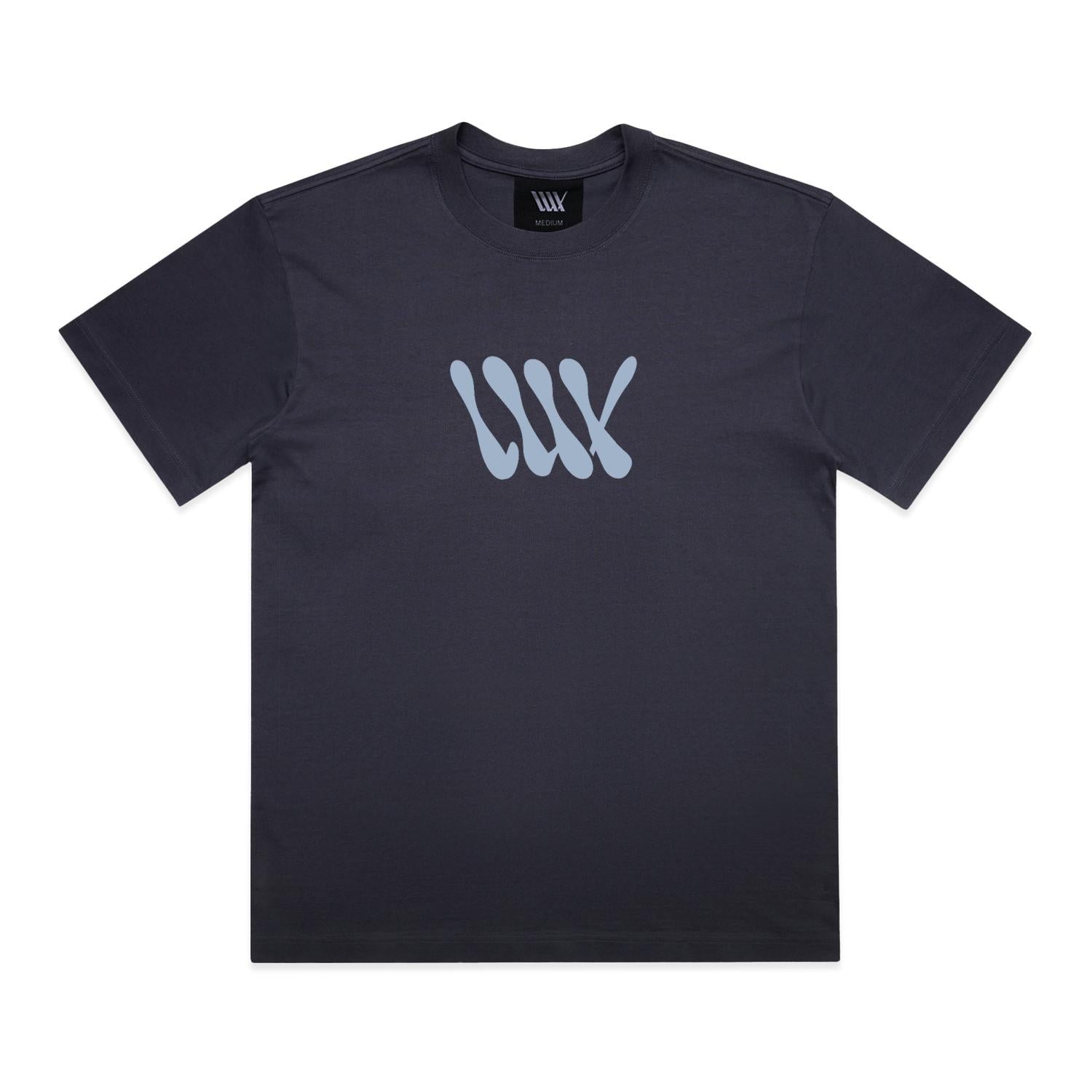 The LUXBMX Times Neue Tee Ink Blue is a black short-sleeve t-shirt crafted from heavyweight cotton, featuring a light blue abstract “WW” logo on the chest and shown laid flat on a white background—an ideal choice for fans of Bicycle Motocross style.
