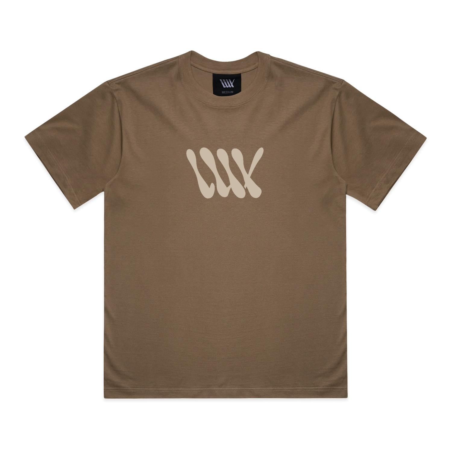 Introducing the LUXBMX Times Neue Tee Walnut—a heavyweight cotton t-shirt in rich walnut brown, featuring a beige abstract "WW" design on the chest and a matching logo tag inside the collar. This tee merges comfort and style, making it an essential addition to any BMX shirt collection.