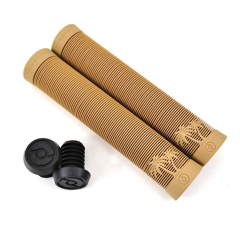 Two tan ribbed bicycle handlebar grips featuring palm tree designs are pictured with two black bar end plugs on a white background—these are the Primo Cali Grips, designed to elevate your BMX riding experience.