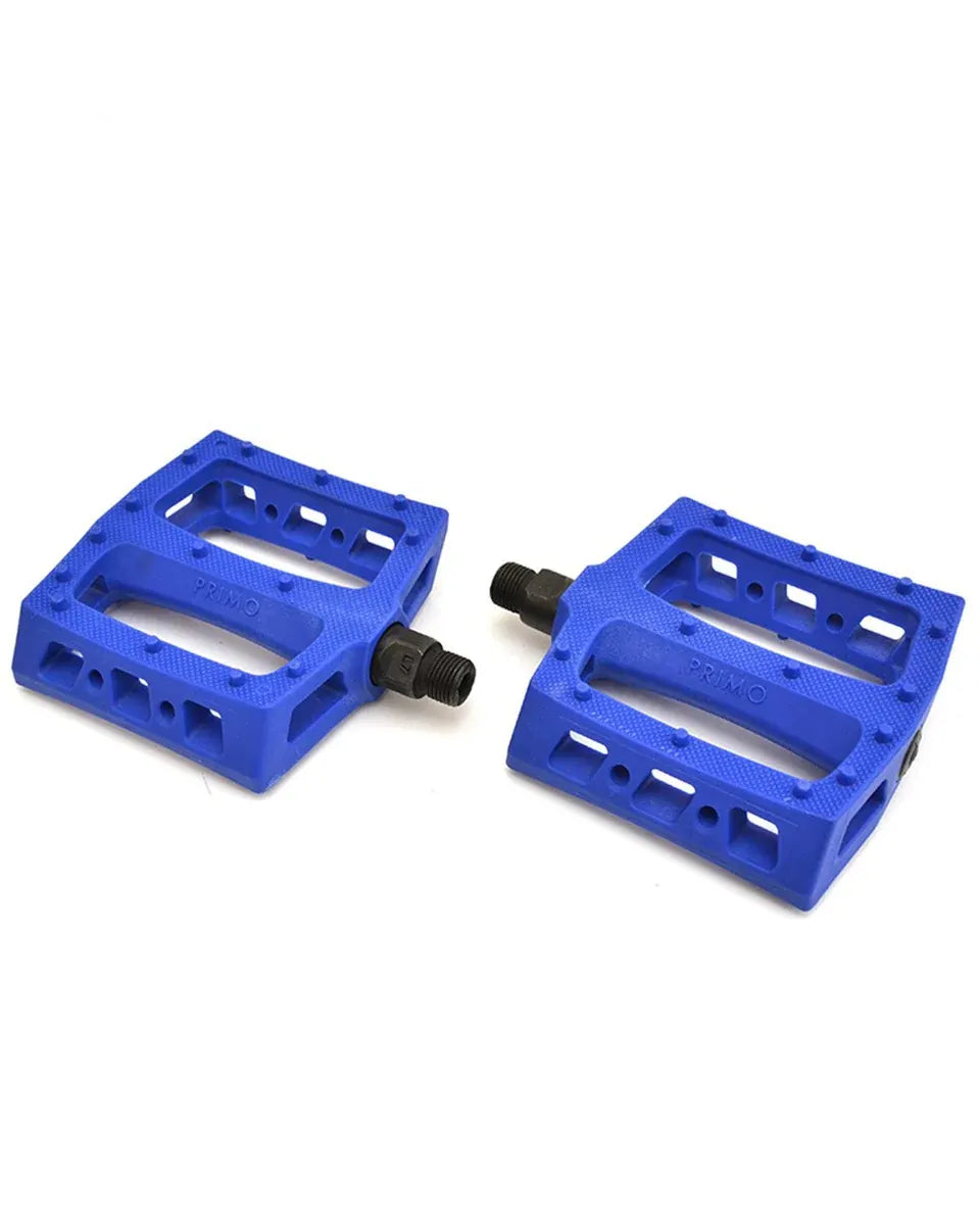Two blue rectangular Primo JJ Palmere Signature Plastic Pedals with durable black chromoly spindles are placed on a white background, each featuring the iconic Primo logo.