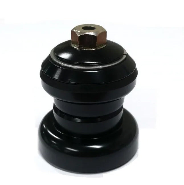 An oversized black Neco "PIG" 1-1/8 Push In Headset with a nut, resembling a pig.