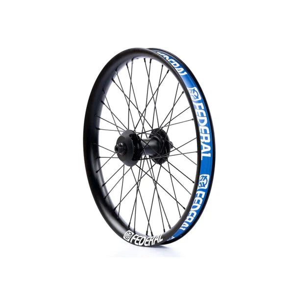 The WKSP Custom Wheel Build showcases a sleek black bicycle wheel with a hub, black spokes, and a rim featuring "Federal" in white on blue. Expert LUXLAB Built Wheels craftsmanship guarantees precision and quality.