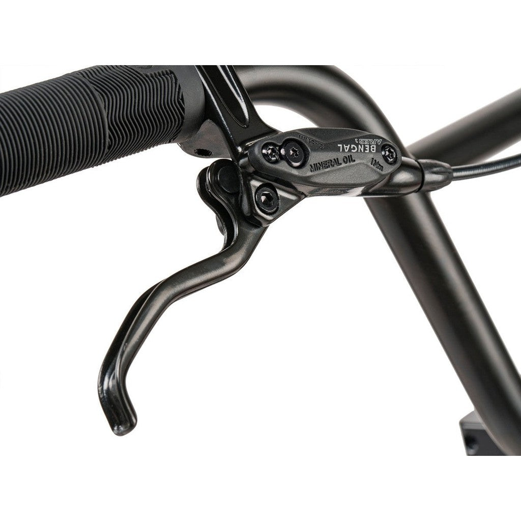 A close up of a black handlebar on a Wethepeople Swampmaster 20 Inch Bike.