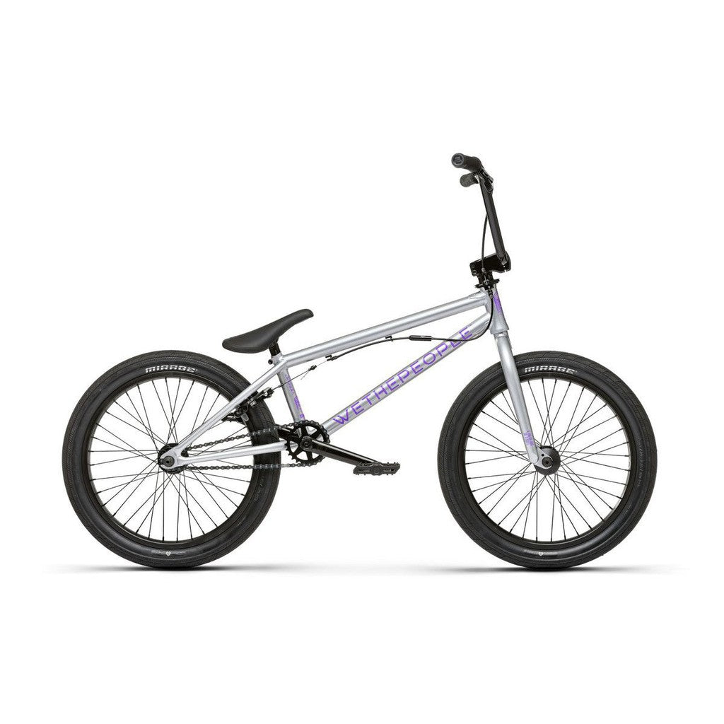 The Wethepeople Versus 20 Inch Bike, featuring a silver Chromoly frame with black handlebars, saddle, and tires, is displayed in side profile against a white background.