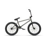 The Wethepeople Envy 20 Inch Bike features a metallic frame with black handlebars, seat, and wheels. Its modern design stands out against a white background, showcasing its advanced style.