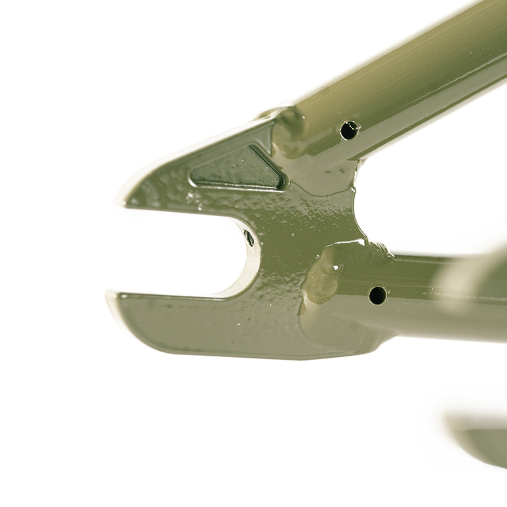 A close up of a green Colony 2024 Sweet Tooth 18 Inch Frame pliers on a white background, featuring the Colony BMX Sweet Tooth Range.
