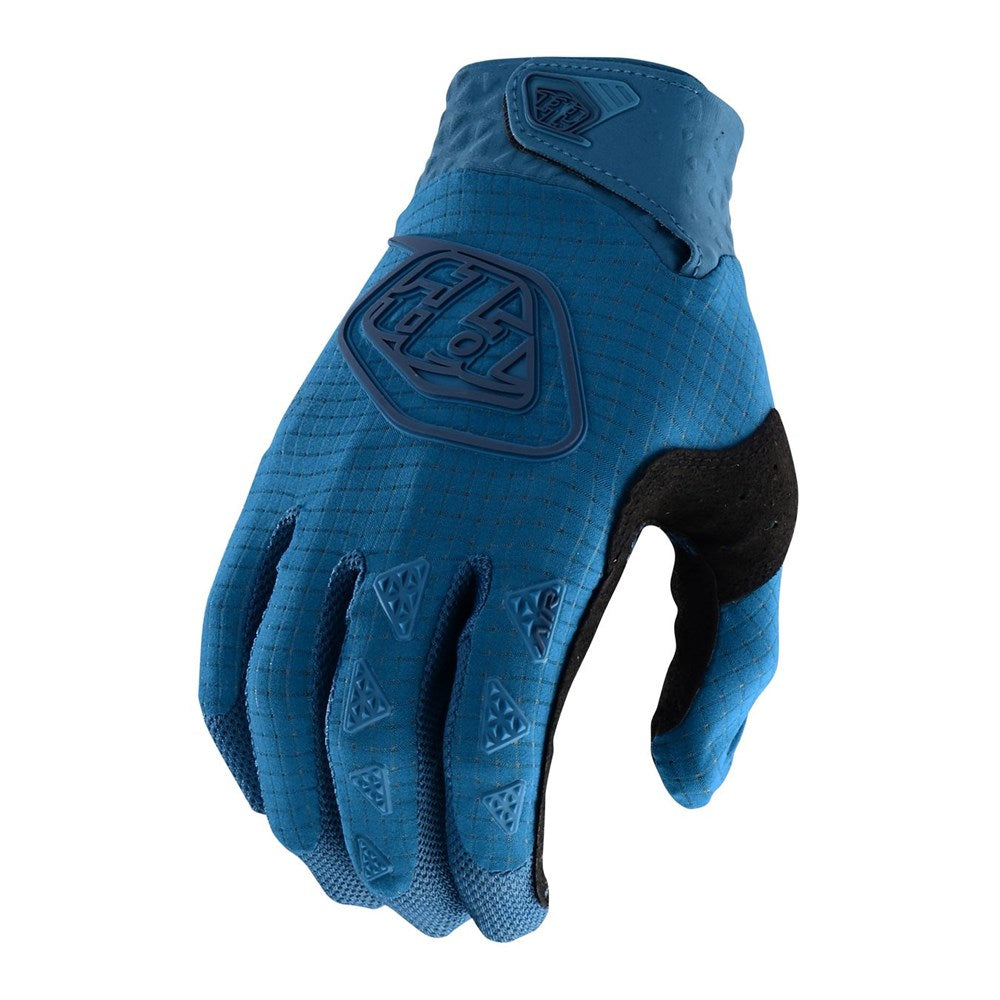 Blue and black TLD Air Glove Slate Blue motocross glove isolated on white background.