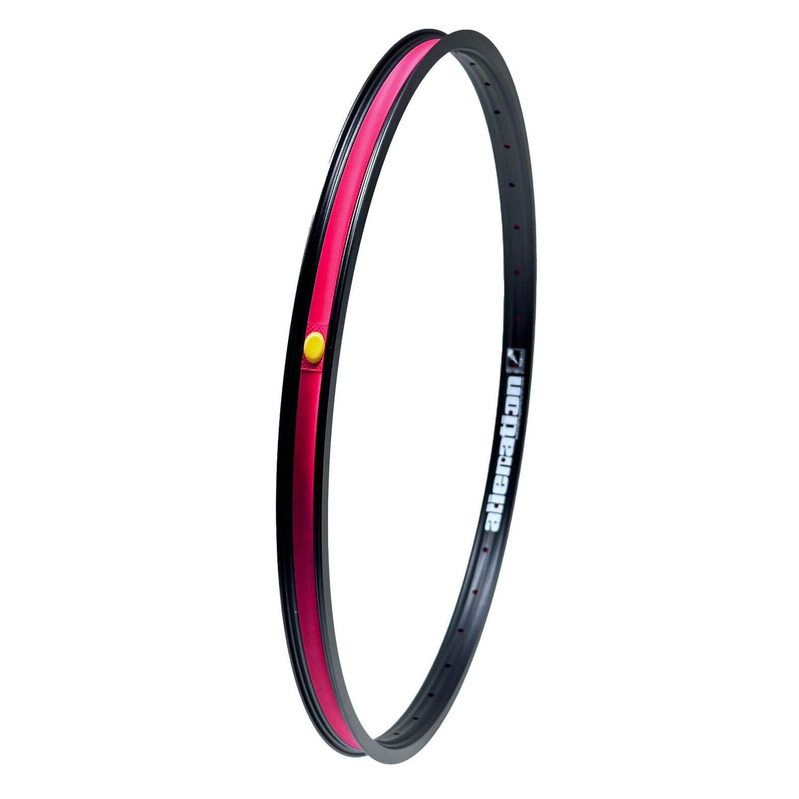 The Alienation Malice G69 TCS OS20 Inch Braked Rim showcases a striking black design with a red inner lining and yellow detailing, prominently featuring the word "Alienation" in white text. It includes advanced TCS Malice technology and incorporates 4D drilling for improved performance and style.