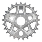 The Alienation Pro Raider Sprocket is a silver 25-tooth sprocket, precision-cut from 7075 aluminum, with geometric cutouts and engraved letters and numbers on its flat surface for optimal chain alignment.