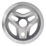 The Alienation Starship Guard Sprocket is a circular metallic bicycle component with three spokes, CNC machined from 7075 aluminum, and features "all-nation bicycle components" and "Designed in USA" engraved on its surface.