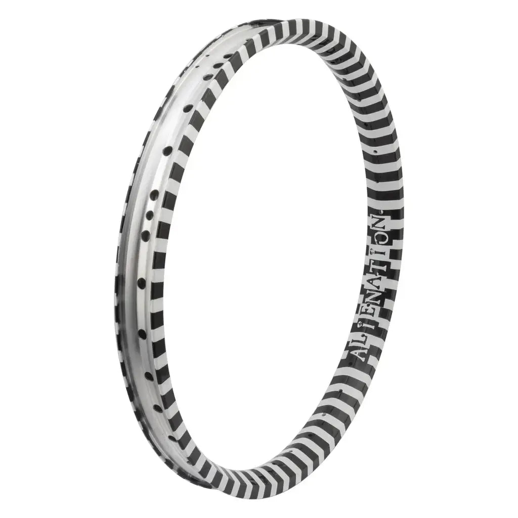 The Alienation Vandal TCS Rim (36H) is an XL bicycle rim with a black and white striped and dotted design, "ALIENATION" branding on the side, and advanced drilling inspired by the Vandal series.
