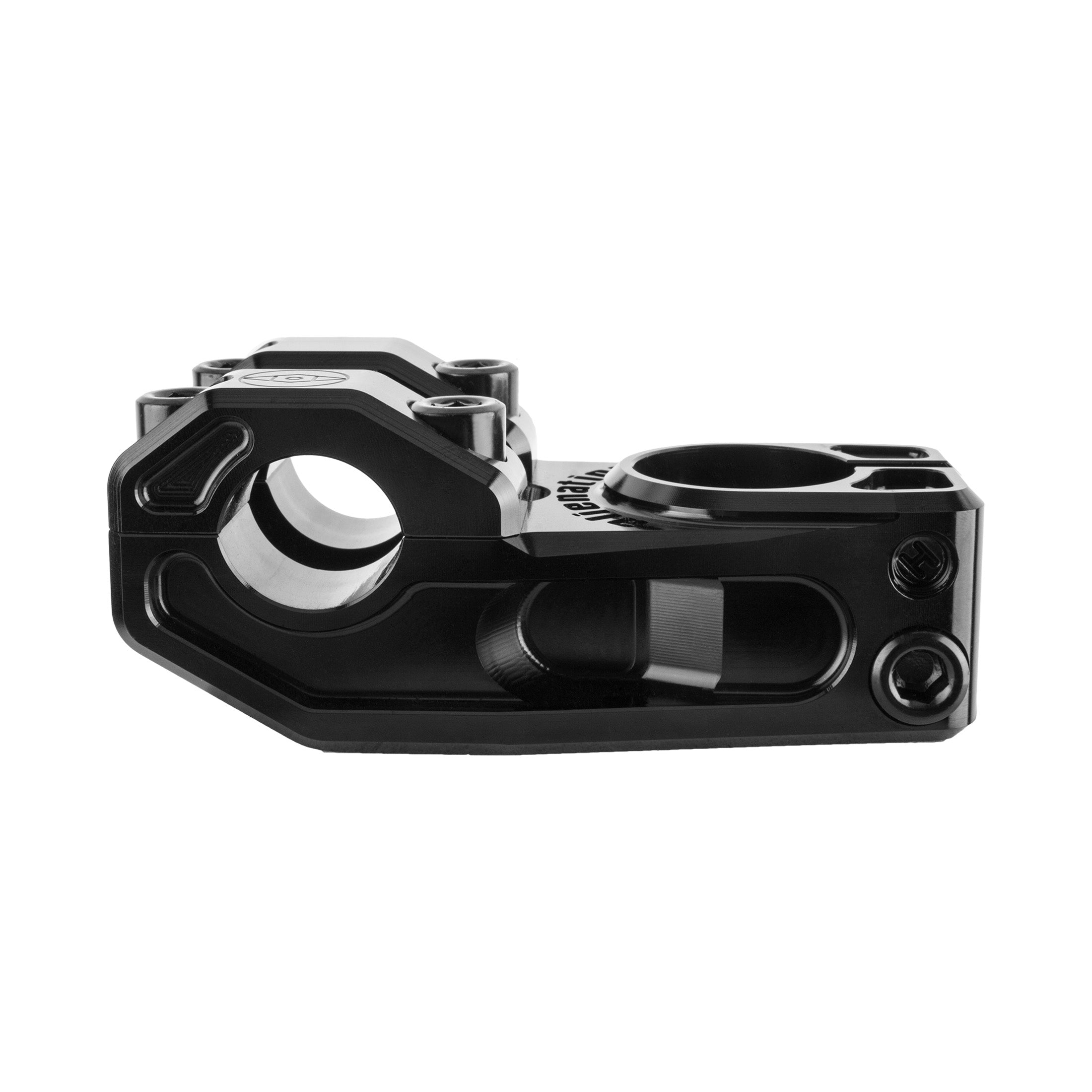 The Alienation Vault Stem is a black anodized aluminum component featuring cylindrical and rectangular openings, rounded edges, and multiple screw holes.