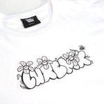 The LUXBMX Ali Crop Tee is a white cropped t-shirt with "CURBLICK" in bubble letters, cartoon flowers, and a small bee above the text. Made from a breathable cotton blend for all-day comfort.