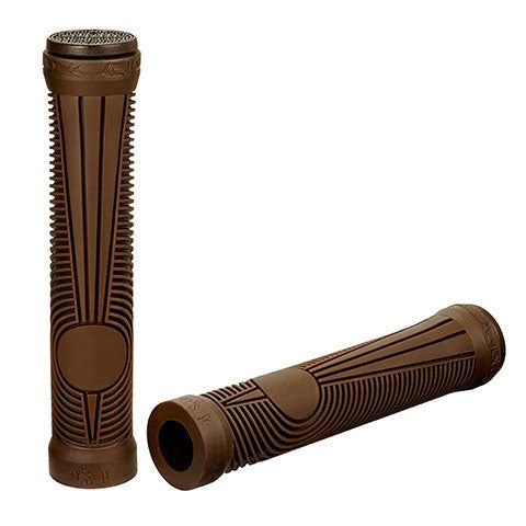 Two brown rubber Animal Nigel Signature Grips with a geometric spiral texture—one upright, one lying down. Inspired by Nigel Sylvester’s signature grip and compatible with Sewer Cap Bar Ends.