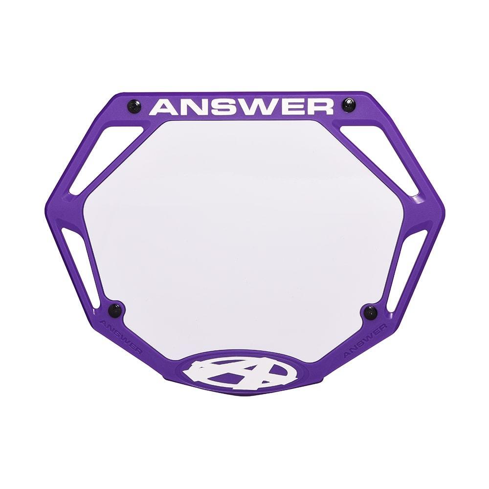 The Answer Mini Number Plate is a purple plastic BMX plate with angular cutouts, white "ANSWER" text at the top, and a stylized "A" logo at the bottom—ideal for smaller bars.