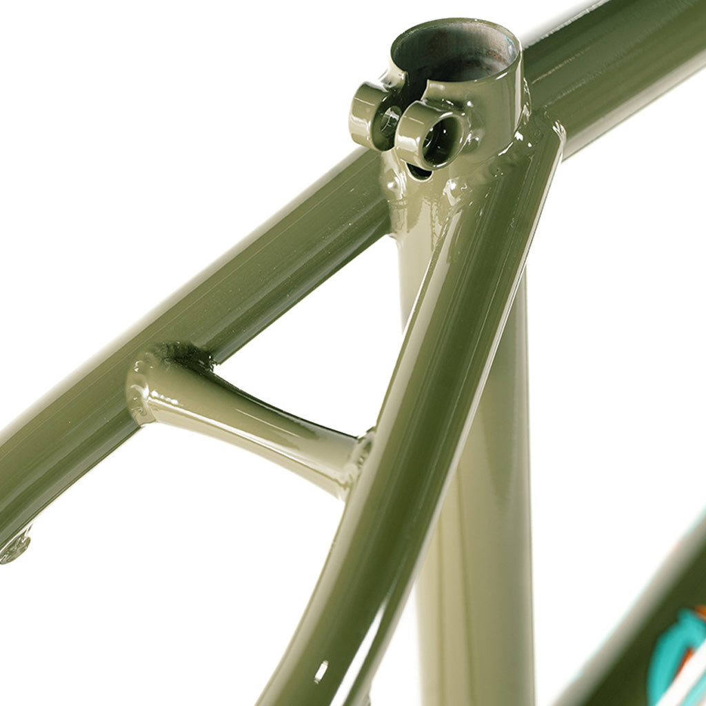 A close up of a green Colony 2024 Sweet Tooth Frame from the Sweet Tooth range.