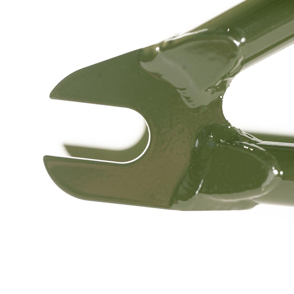 A close up of a green Colony 2024 Sweet Tooth Frame from the Sweet Tooth Range on a white background.