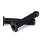 The Wethepeople Arrow (Junior) Grips, featuring a sleek design in black, include two grips made from high-quality vex-k6 rubber. One grip is positioned horizontally and the other diagonally, providing superior comfort and control for young BMX riders.