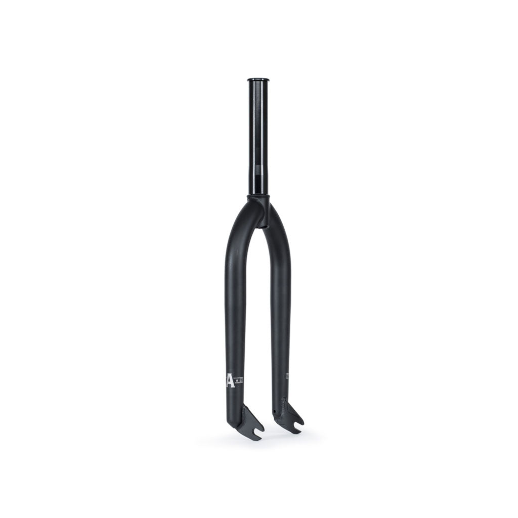 A black Wethepeople Audio 22 Inch Forks with a cylindrical steerer tube, featuring an integrated crown race and CNC dropout detail, designed for holding the front wheel of a bike.