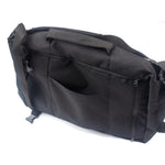 The Avian Chillmore Bag is a black messenger bag with a top handle, zipper pocket, and front open pocket—an ideal choice for stylish racers on race day. Displayed on a crisp white background.
