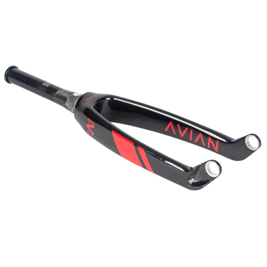 The Avian Versus Pro 20 Inch 20mm Tapered Carbon Fork, adorned with "AVIAN" on the side, is a sleek choice for BMX racing frames in striking black and red.