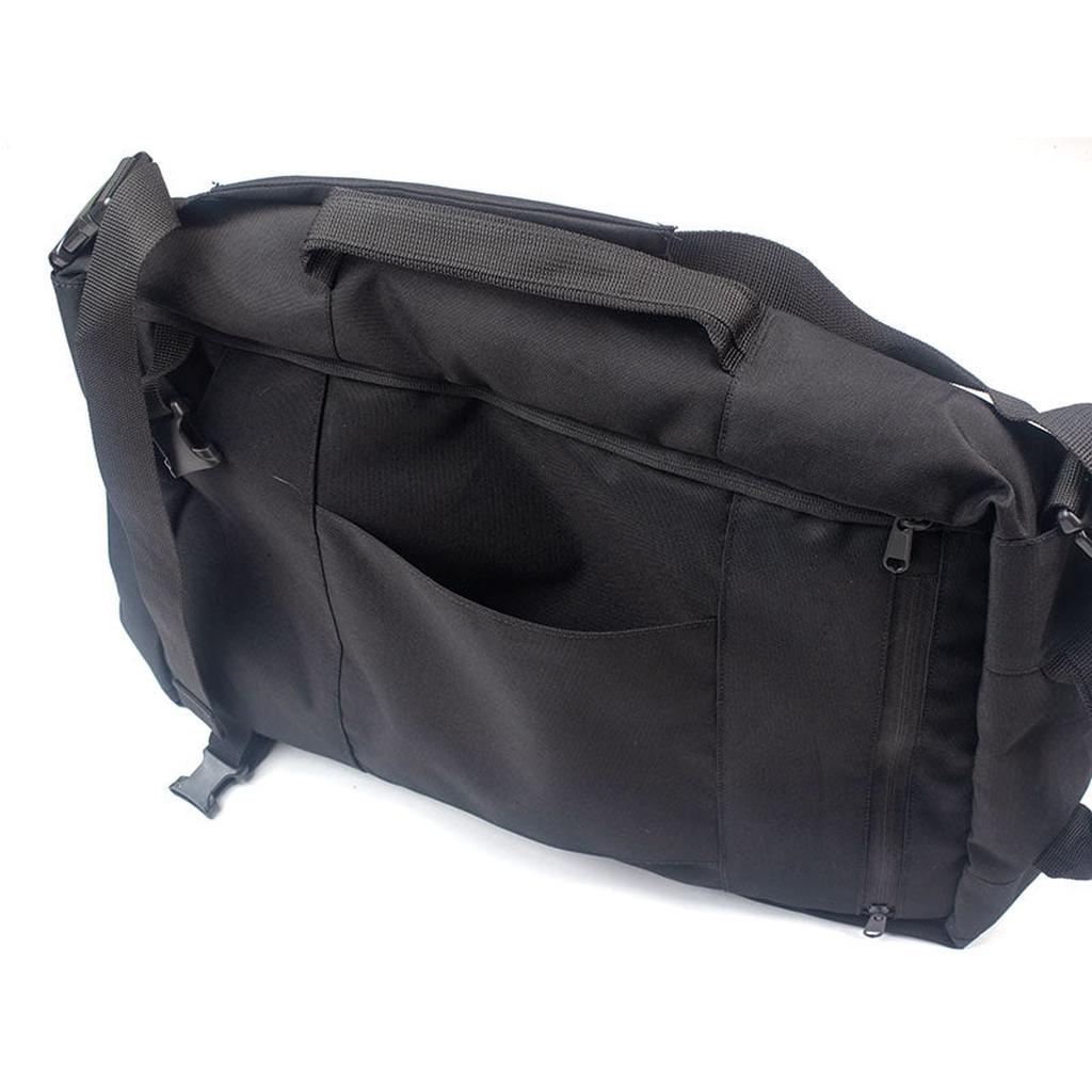 The Avian Chillmore Bag is a black messenger bag with a top handle, zipper pocket, and front open pocket—an ideal choice for stylish racers on race day. Displayed on a crisp white background.
