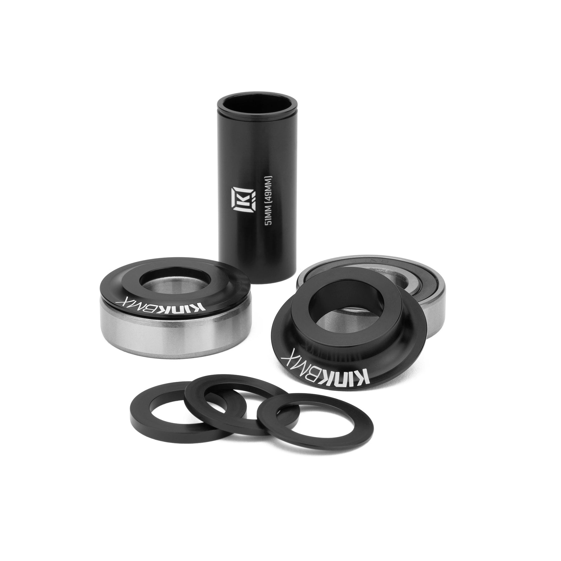 The Kink MID Bottom Bracket features durable 6061-T6 aluminum parts in black and silver, including precision sealed bearings, spacers, and branded caps—all neatly arranged on a white background.