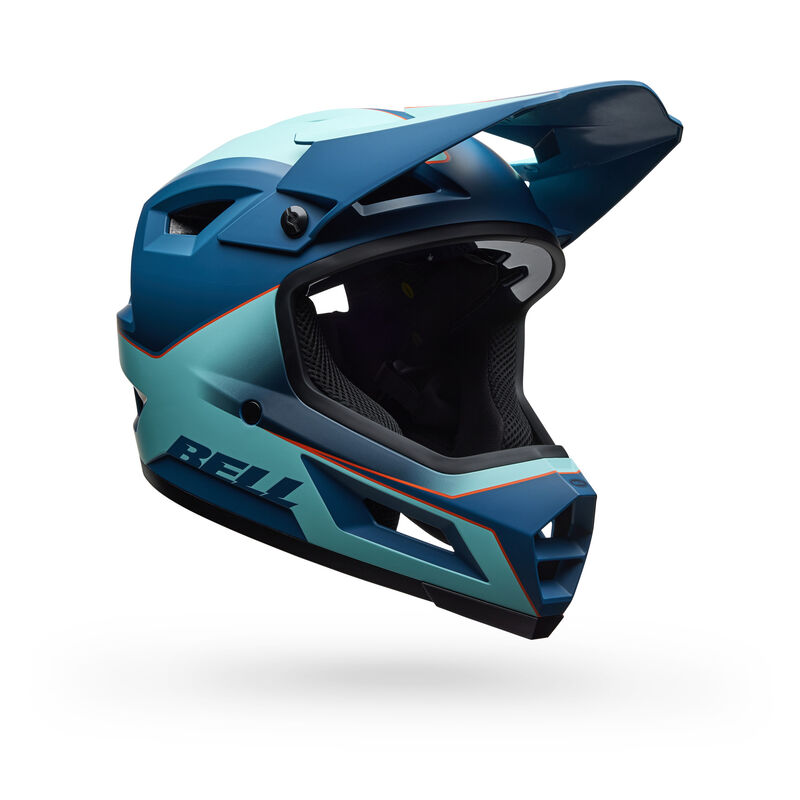 The Bell Sanction 2 DLX MIPS helmet, in matte blue and teal with "BELL" branding, features a visor and black interior. It's an affordable, lightweight full-face design perfect for those seeking style without compromising safety.