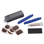 Explore the Beto I-Patch Tube Repair Kit with blue tire levers, adhesive patches, a glue tube, and a sandpaper strip, all conveniently stored in a plastic carrying case.