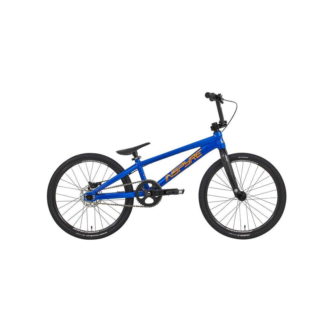 A blue Inspyre Evo-C Disc Expert Bike 2026 with black tires, straight top tube, and flat handlebars, shown from the side on a white background.
