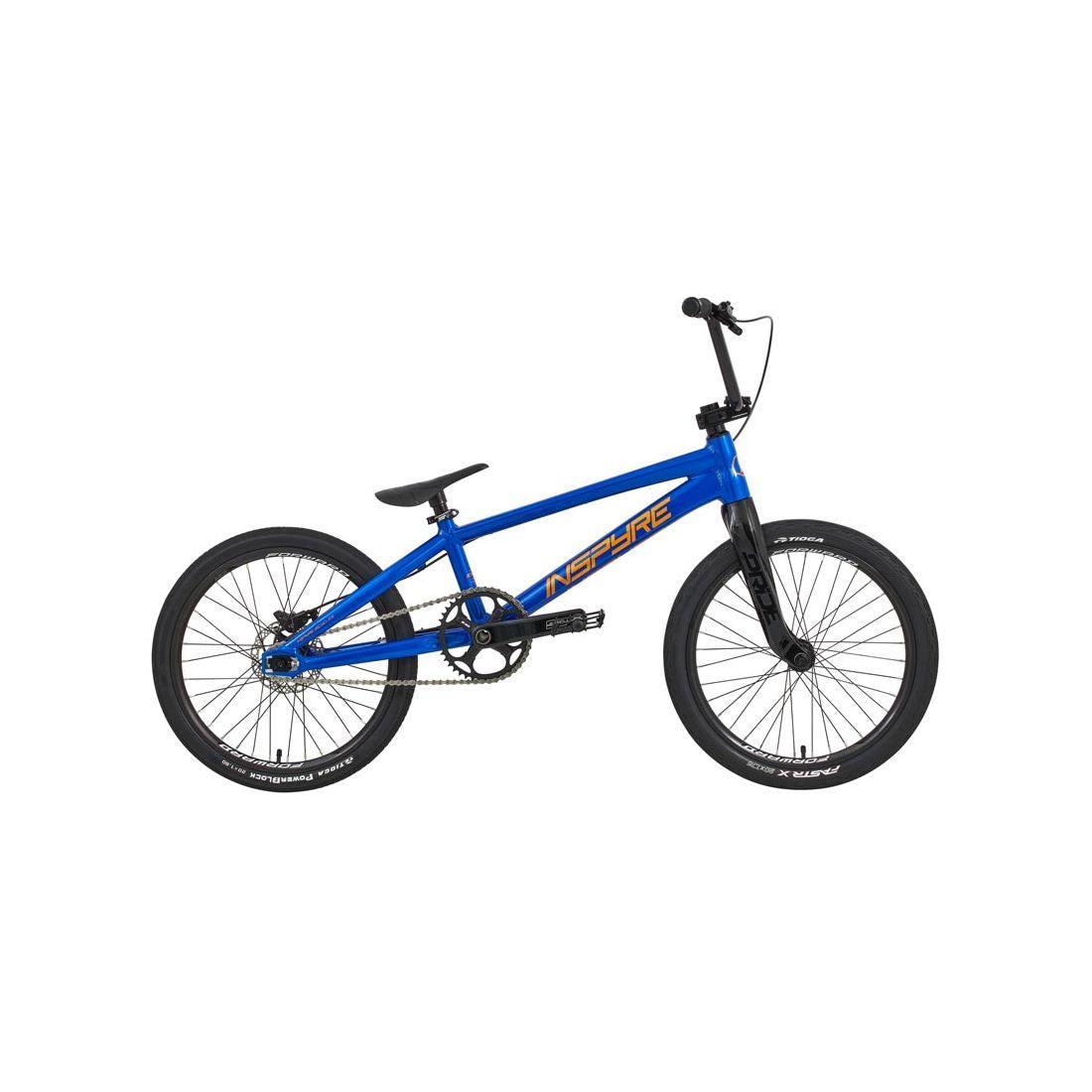 The Inspyre Evo-C Disc Pro XXL Bike 2026 is a blue BMX with black tires, a black seat, and "NSYIRE" in yellow and orange on the frame, shown against a plain white background.