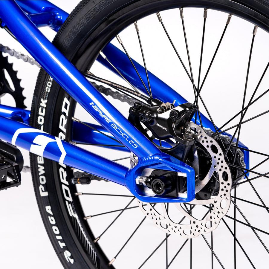 A close up of a blue Inspyre Evo Disc Expert XL Bike with a disc brake.