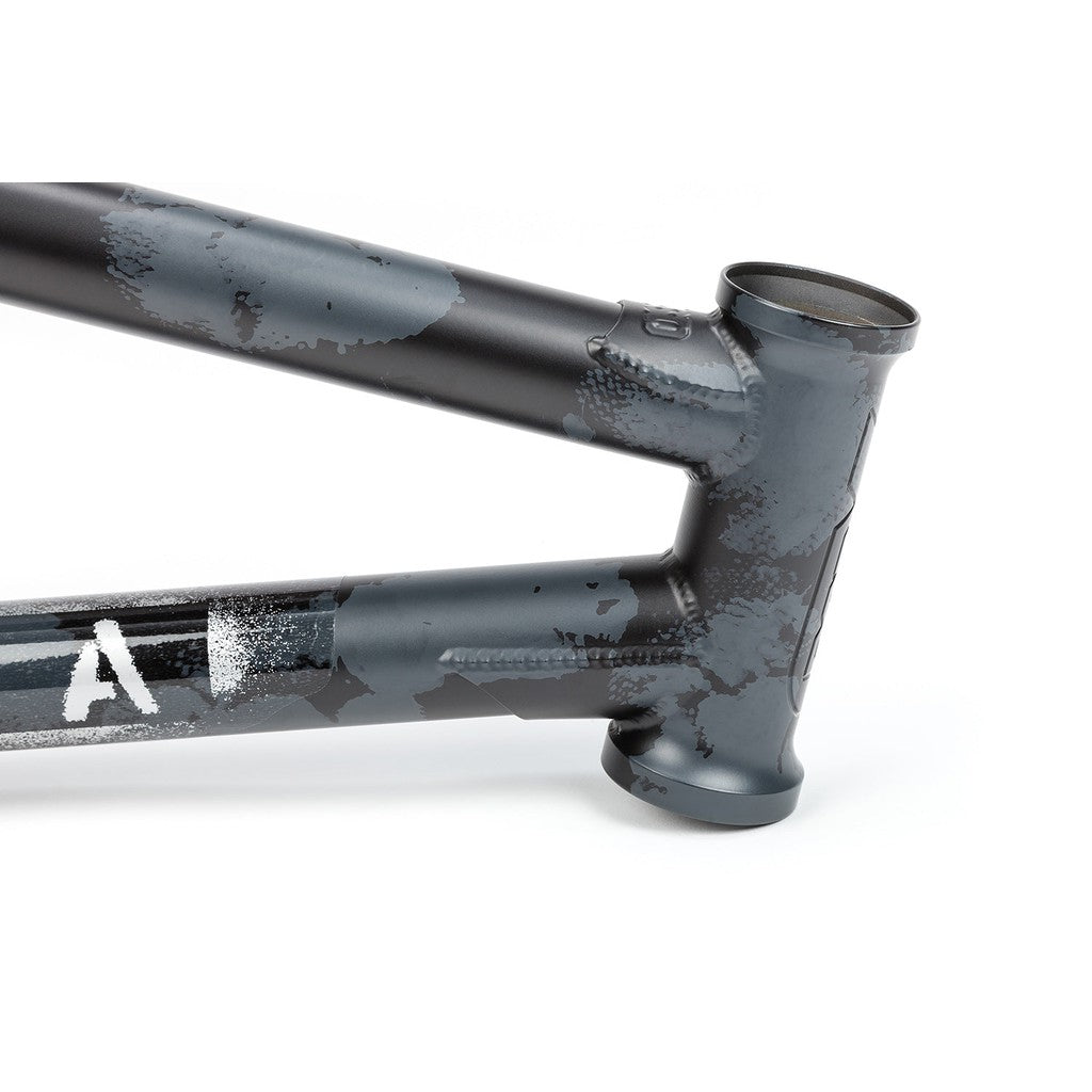 Close-up of a worn BSD Soulja V3 Frame, showing chipped paint and signs of wear on a gray background.