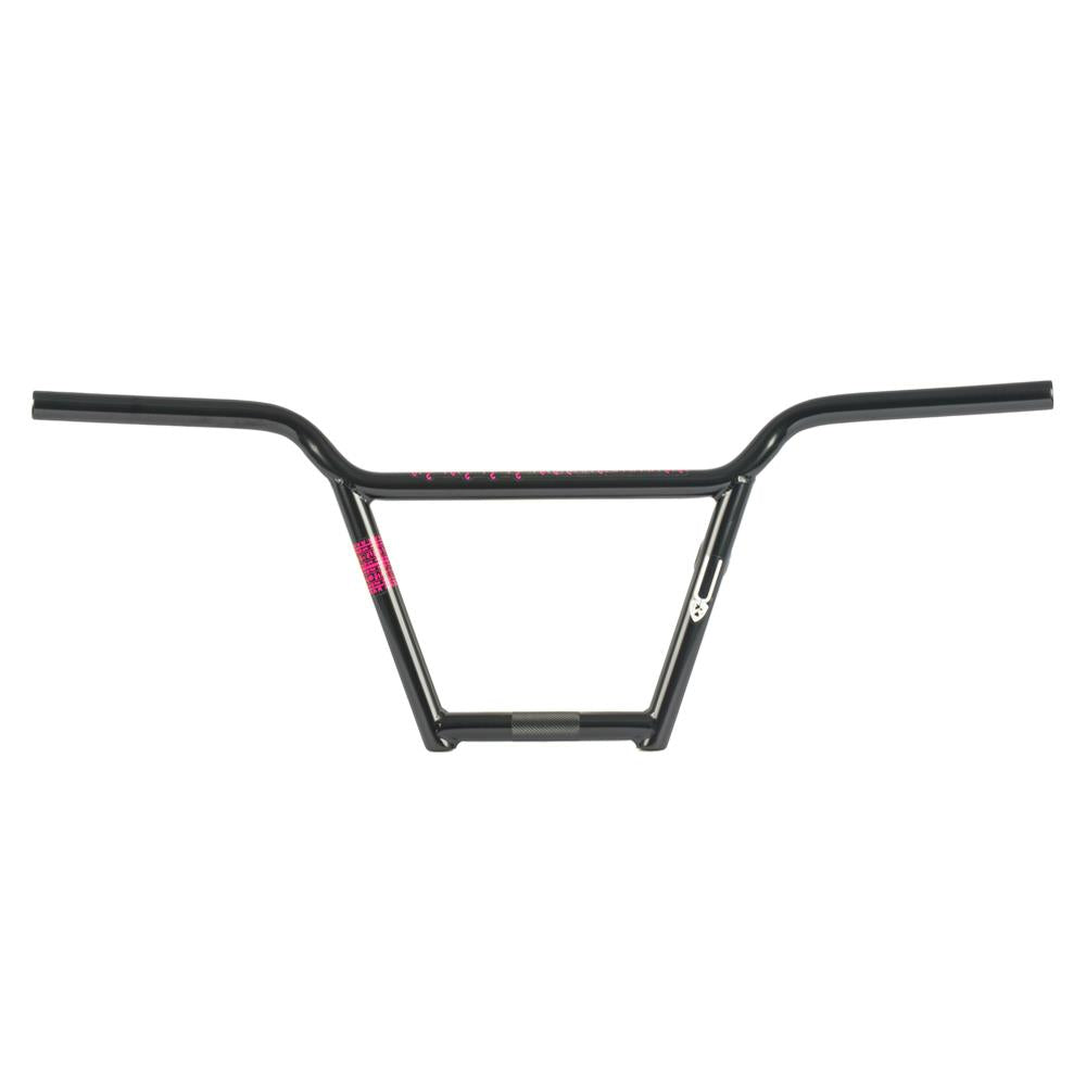 The Subrosa OM 4pc Bars are black BMX handlebars with a straight crossbar, slight upward and outward bends, small pink graphics, and a Subrosa Om Bars logo on the right side.