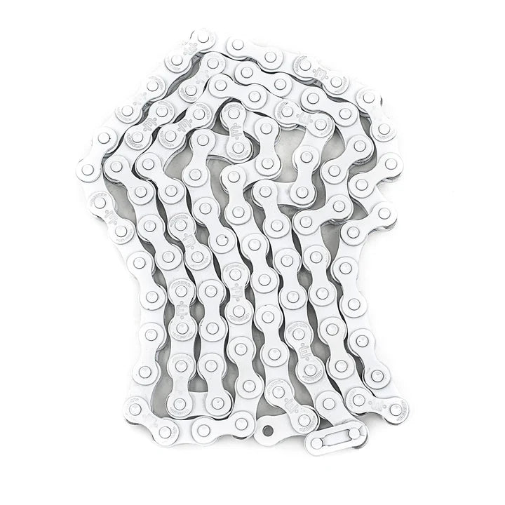 A silver Mission 510 freestyle BMX chain coiled on a white background.
