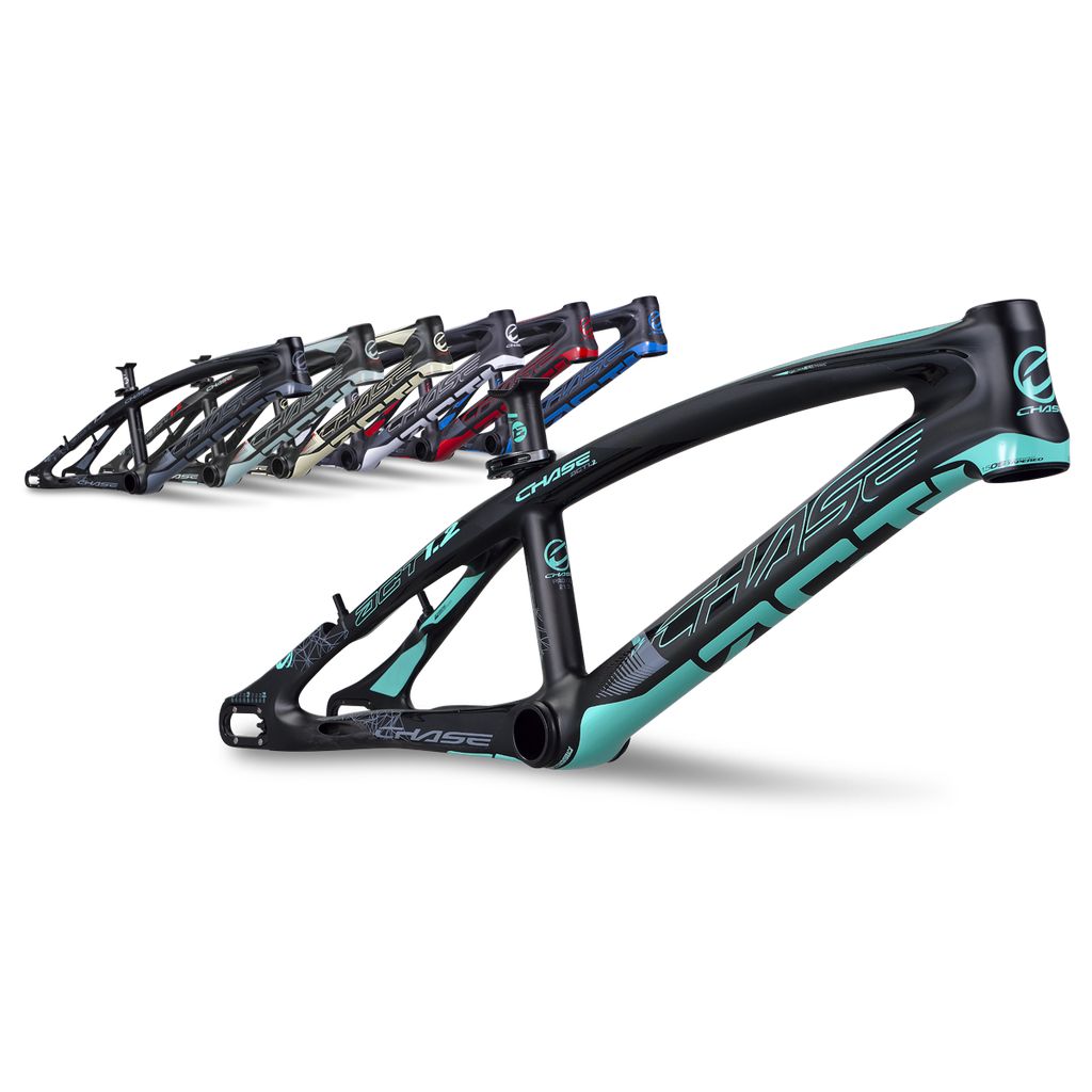 A lineup of various bicycle frames in different colors, featuring black with teal accents, includes the advanced carbon technology of the Chase ACT 1.2 Carbon BMX Race Frame Pro XL, all arranged in a row in the background.