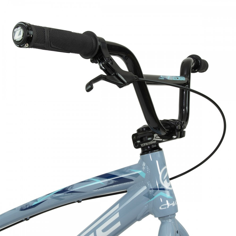 A Chase Edge Pro Cruiser Bike (2024), in a vibrant blue and black color combination, showcased on a clean white background.