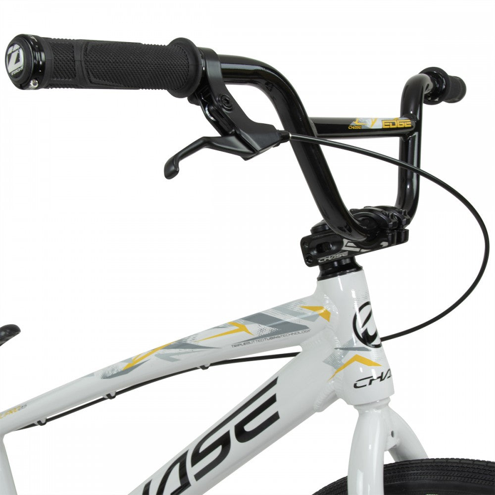 A white and yellow Chase Edge Pro Cruiser Bike (2024) on a white background.